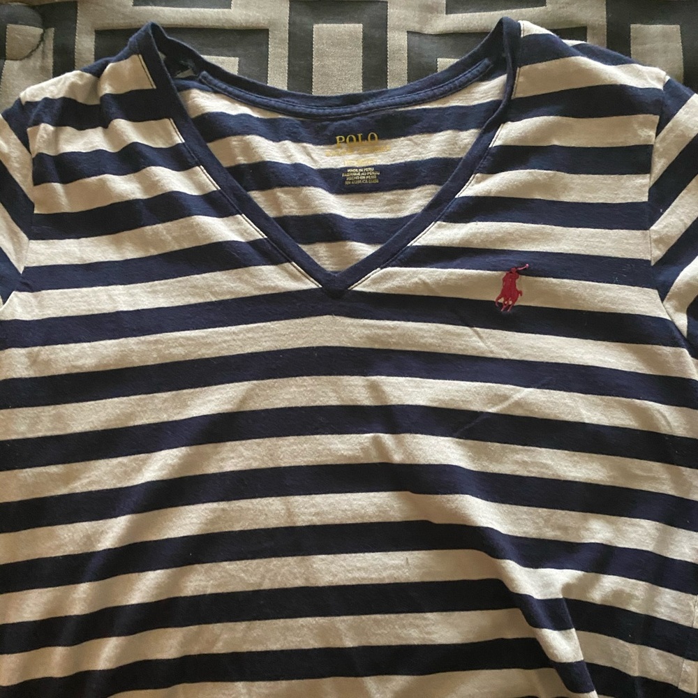 Women’s navy blue and white polo tee